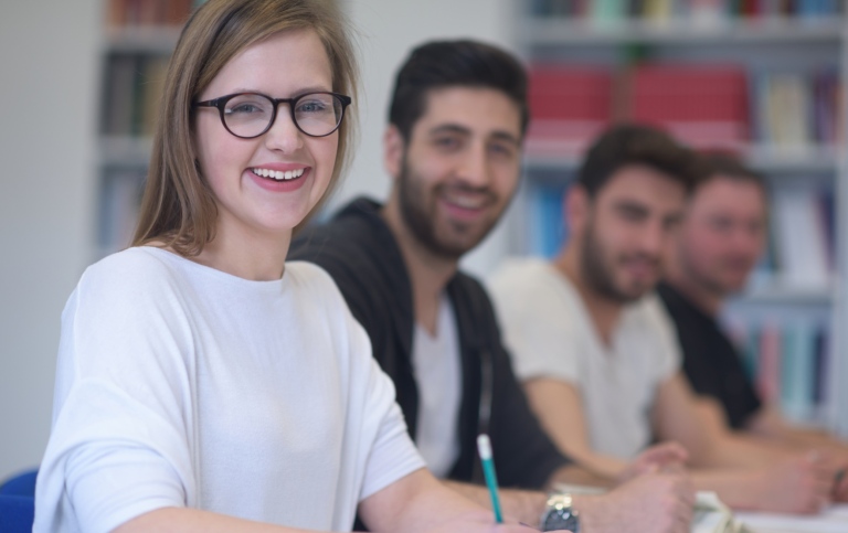 Group of students study together in classroom. Photo: Mostphotos/Dotschock. 